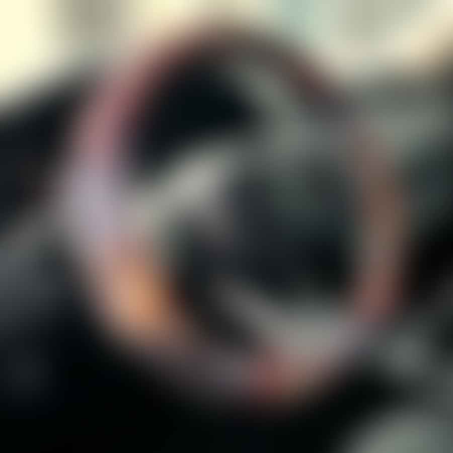 A non-slip steering wheel cover for seniors