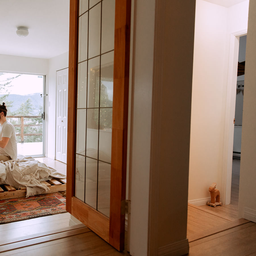 Senior adult and young person enjoying a PS4 game together