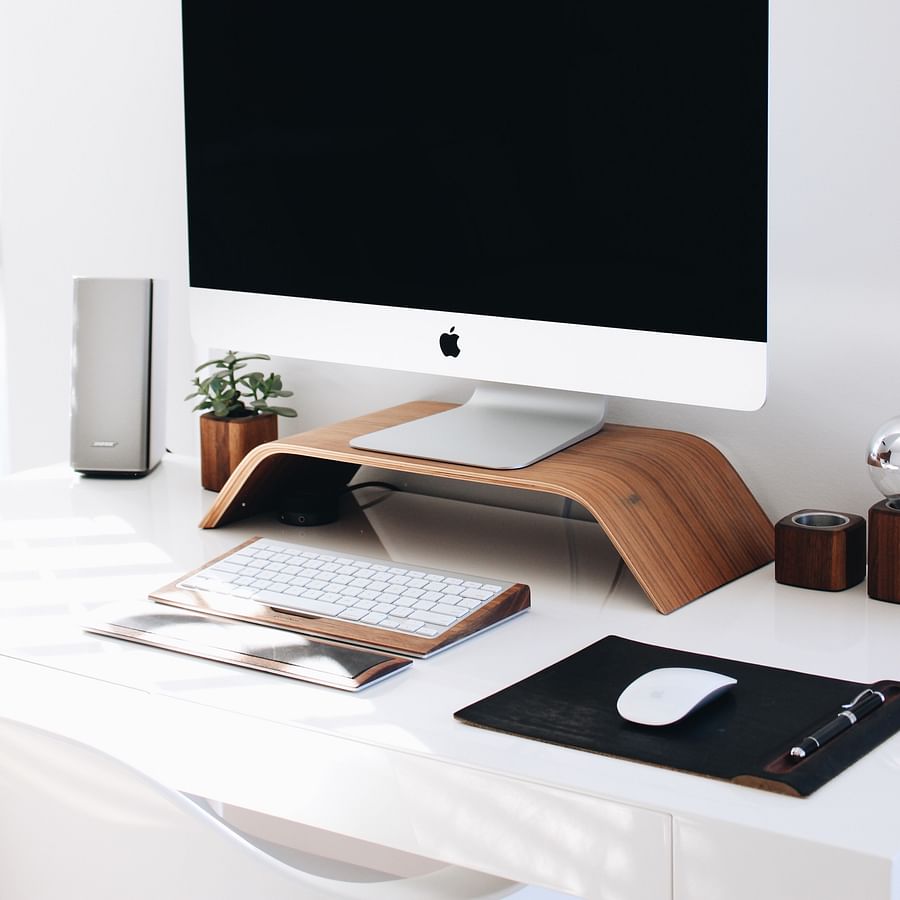 Senior citizen comfortably using a computer mouse for internet browsing
